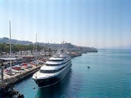 Beautiful harbor and old town of Antalya with mountains in the background